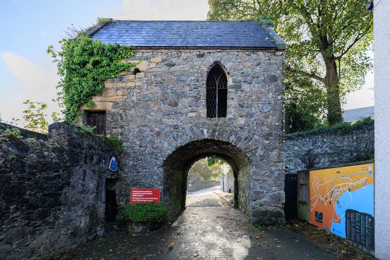 Kilkenny Castle and Gardens, Kilkenny City Historic medieval stone archway in Carlingford, County Louth, Ireland.