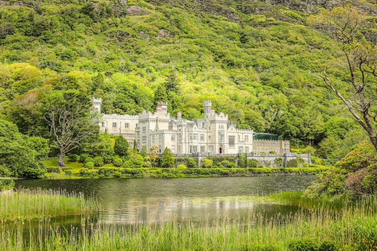 Cobh, Co Cork Kylemore Abbey nestled in lush greenery by the serene lakeside in Ireland.