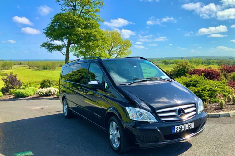 A Mercedes Viano parked with a scenic backdrop