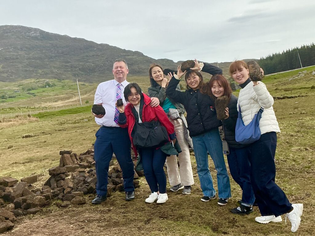 Paul with a group of Japanese ladies on a trip around Ireland 