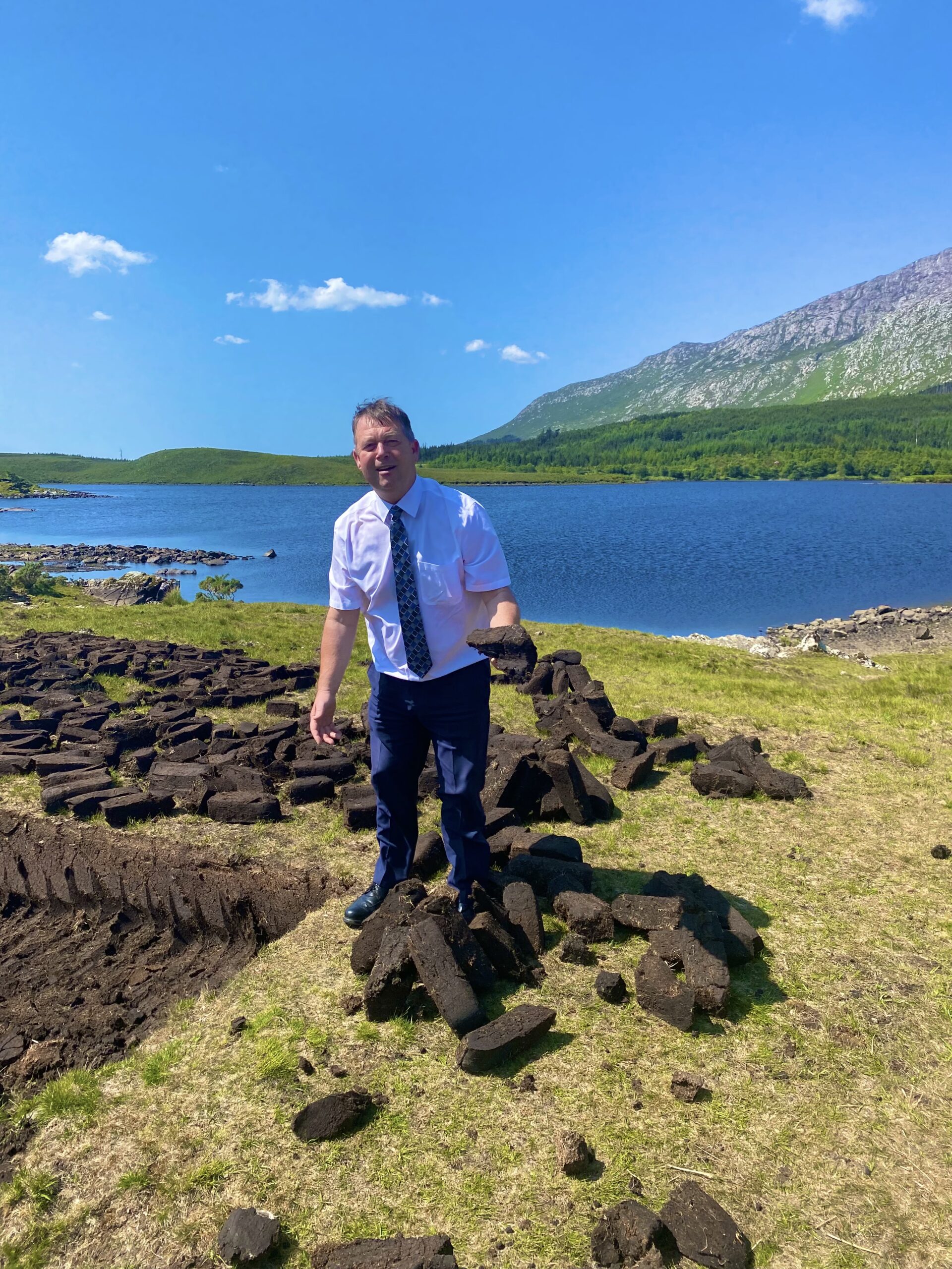 Paul our Driver Guide showing our guests the peat bogs in Galway