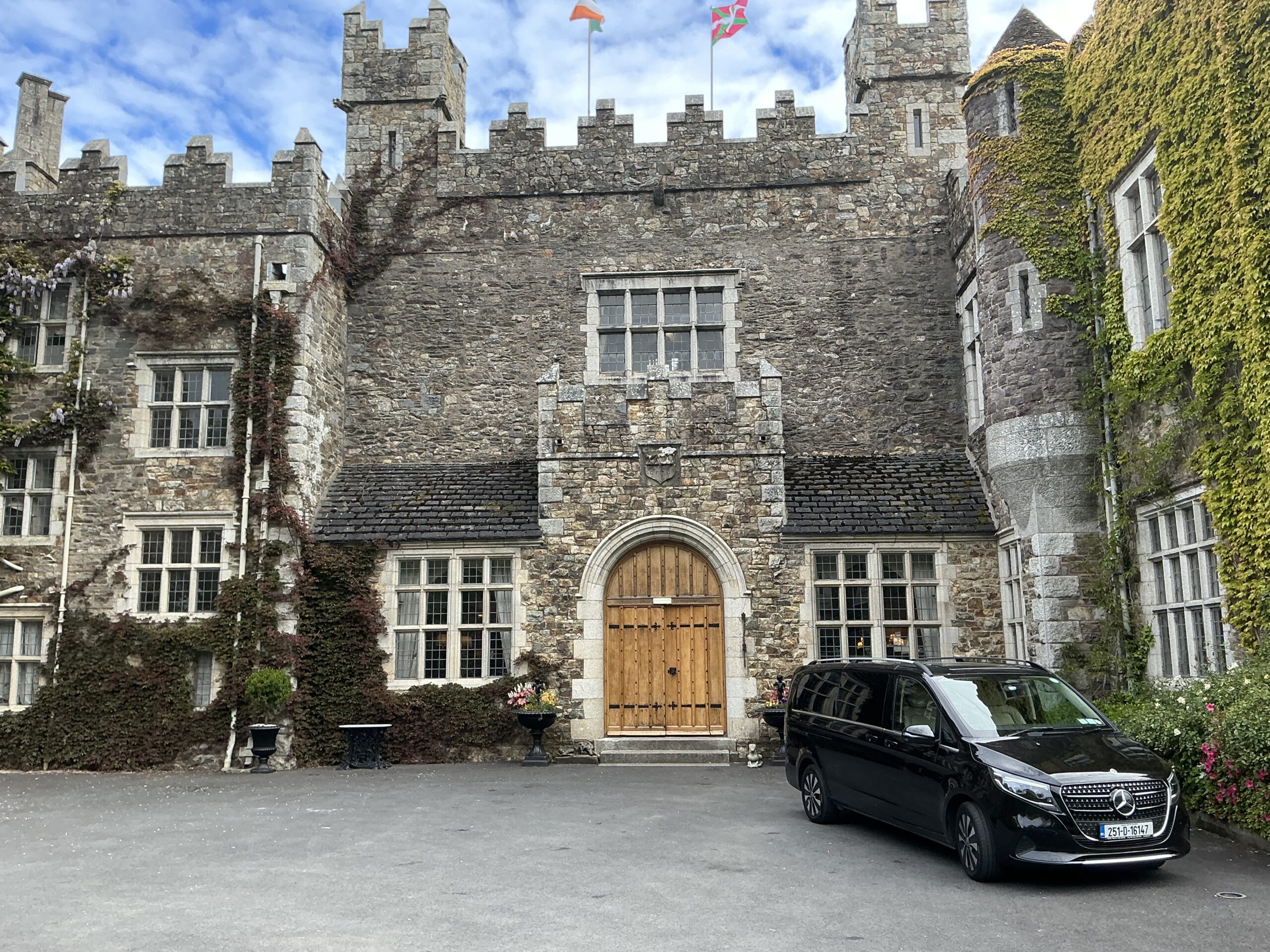 In the background Waterford Castle hotel 